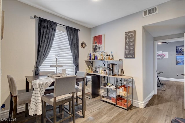 dining room with hardwood / wood-style floors