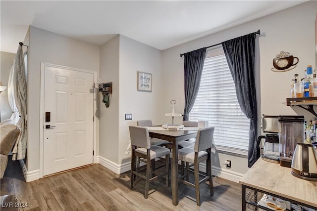 dining room featuring wood-type flooring