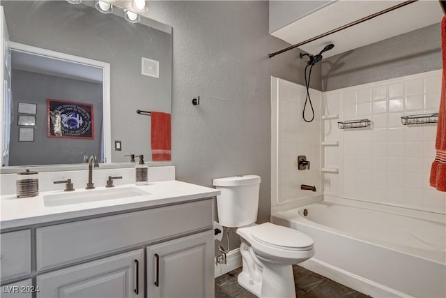 full bathroom with tile patterned floors, vanity, toilet, and shower / washtub combination