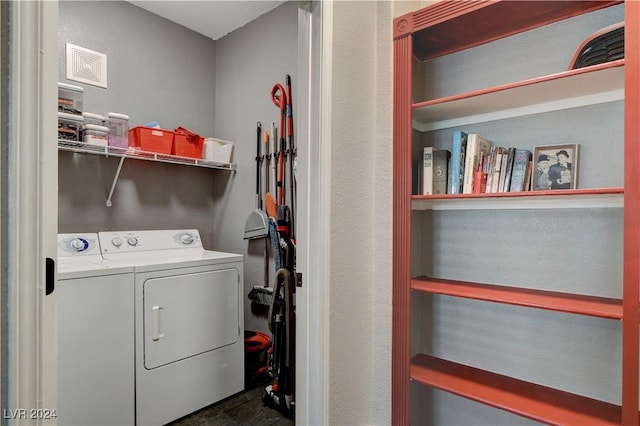 laundry area featuring washing machine and clothes dryer