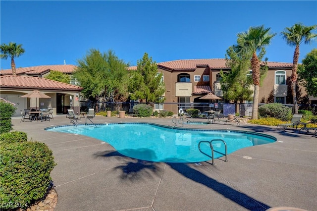 view of pool with a patio area