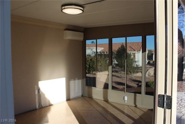 unfurnished room with a wall mounted air conditioner