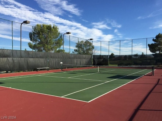 view of sport court featuring basketball court