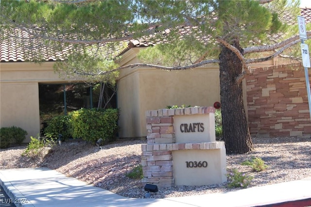 view of community sign