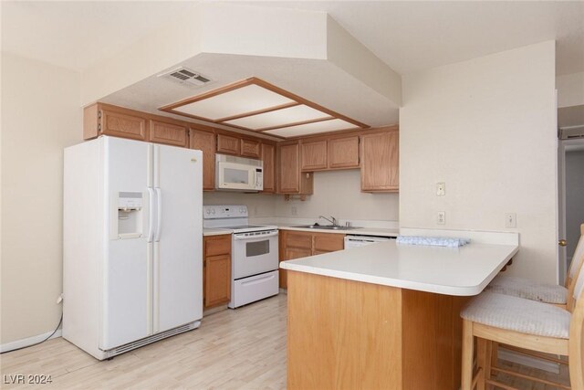 304 S Buffalo Dr Unit 201, Las Vegas, NV 89145 - kitchen featuring sink, white appliances, kitchen peninsula, and light hardwood / wood-style flooring