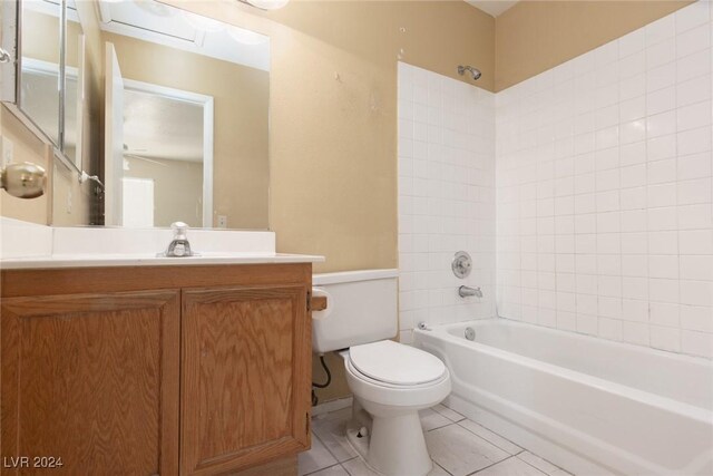 304 S Buffalo Dr Unit 201, Las Vegas, NV 89145 - full bathroom featuring tile patterned flooring, vanity, tiled shower / bath combo, and toilet