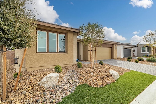 view of front of property with a garage