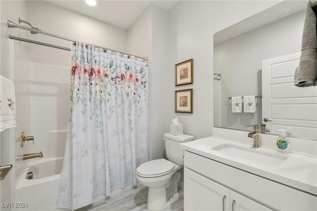 full bathroom featuring shower / tub combo with curtain, vanity, and toilet