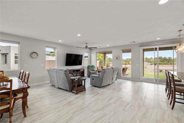 living room featuring ceiling fan