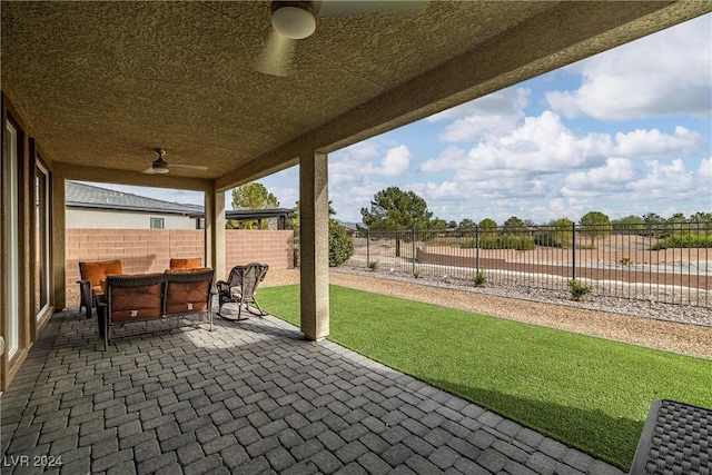 view of patio with ceiling fan