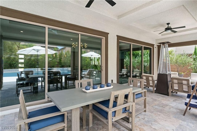 view of patio / terrace featuring ceiling fan