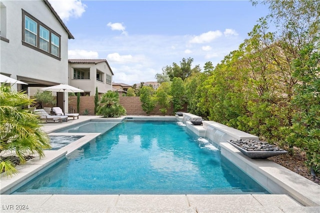 view of pool with pool water feature