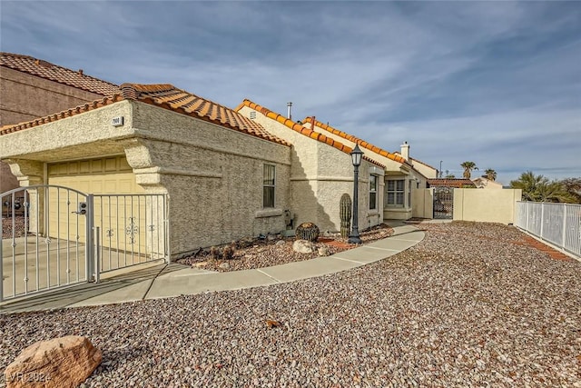 exterior space with a garage