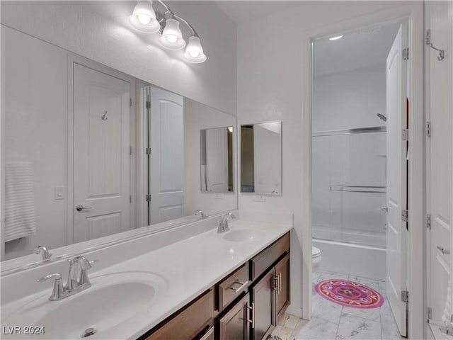 full bathroom featuring vanity, toilet, and washtub / shower combination