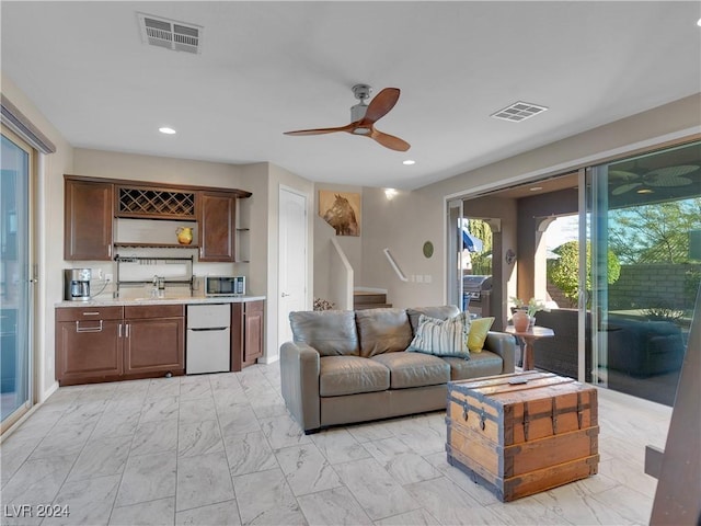 living room with ceiling fan