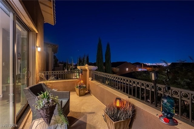 view of balcony at night