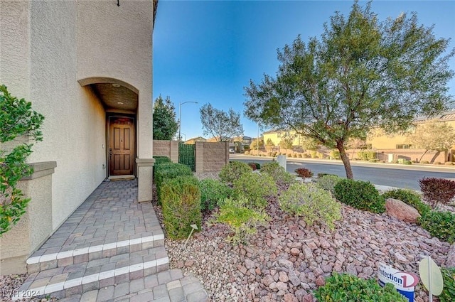 9303 Ettrick Ct, Las Vegas, NV 89178 - property entrance featuring stucco siding