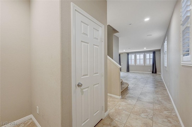 9303 Ettrick Ct, Las Vegas, NV 89178 - hallway with stairway, baseboards, and recessed lighting