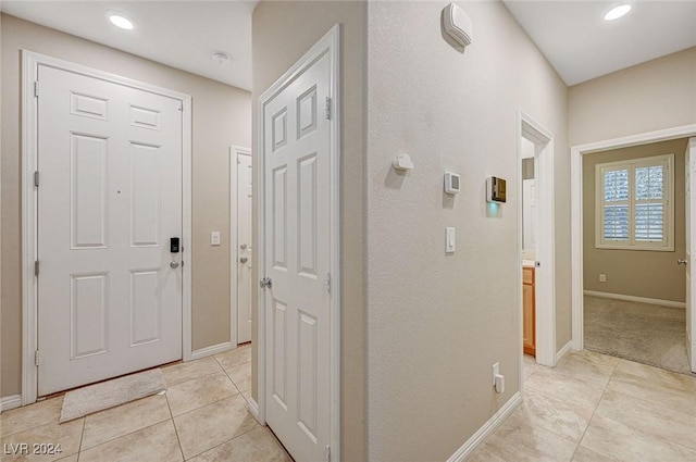 9303 Ettrick Ct, Las Vegas, NV 89178 - entrance foyer with light tile patterned floors, baseboards, and recessed lighting