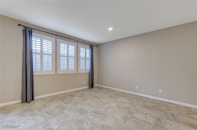9303 Ettrick Ct, Las Vegas, NV 89178 - empty room featuring recessed lighting and baseboards