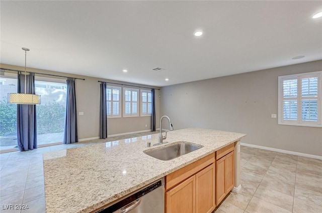 9303 Ettrick Ct, Las Vegas, NV 89178 - kitchen featuring a sink, healthy amount of natural light, light tile patterned floors, light stone countertops, and recessed lighting
