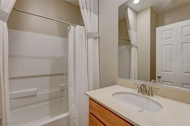 9303 Ettrick Ct, Las Vegas, NV 89178 - full bathroom featuring vanity and shower / bath combination with curtain