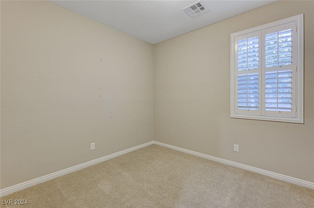 unfurnished room with carpet