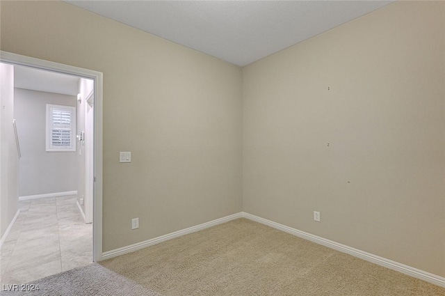 9303 Ettrick Ct, Las Vegas, NV 89178 - empty room with light colored carpet and baseboards