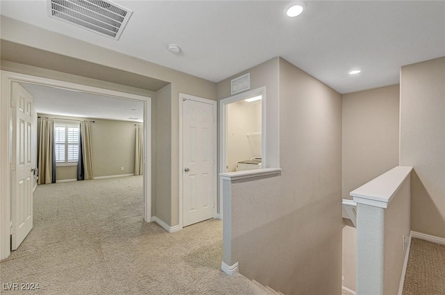 9303 Ettrick Ct, Las Vegas, NV 89178 - hall featuring carpet, an upstairs landing, baseboards, and recessed lighting