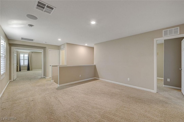 9303 Ettrick Ct, Las Vegas, NV 89178 - spare room with light colored carpet, baseboards, and recessed lighting