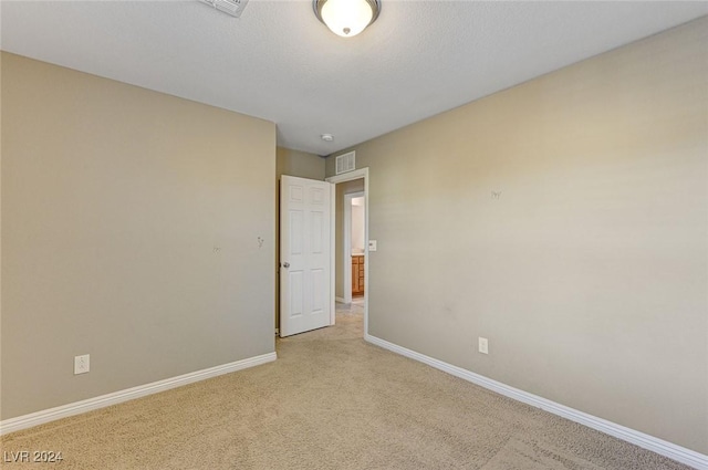 9303 Ettrick Ct, Las Vegas, NV 89178 - spare room featuring light carpet and baseboards