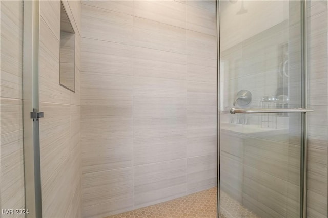 bathroom with an enclosed shower