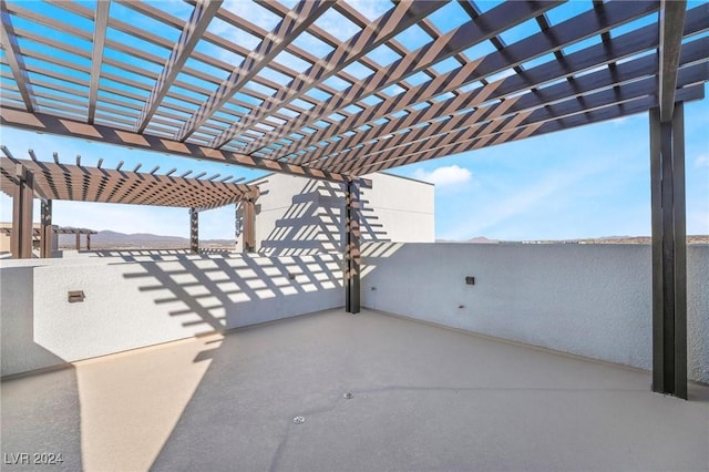 view of patio featuring a pergola