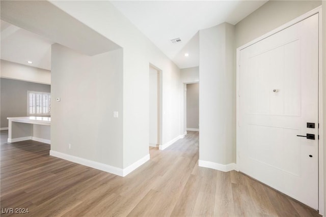 entryway with light hardwood / wood-style floors