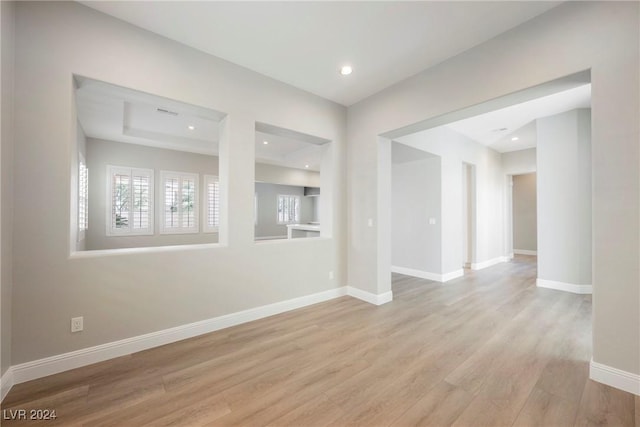 unfurnished room featuring light wood-type flooring