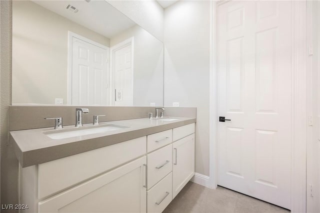 bathroom featuring vanity and tile patterned floors