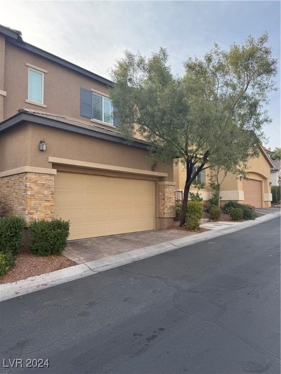 front of property featuring a garage