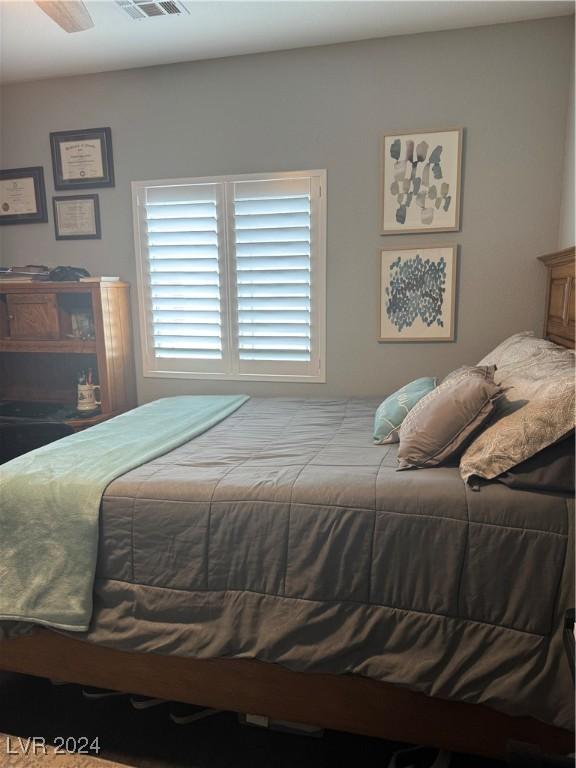 bedroom featuring ceiling fan