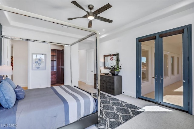 bedroom with french doors, light colored carpet, ceiling fan, and access to outside