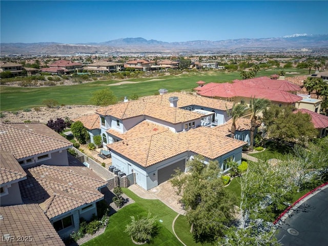 birds eye view of property featuring a mountain view and a residential view