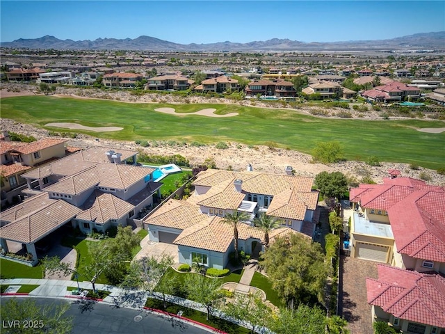 birds eye view of property featuring a mountain view, golf course view, and a residential view