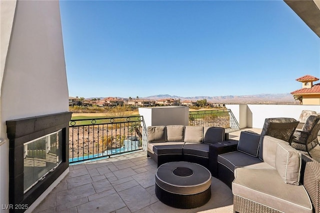 view of patio / terrace with outdoor lounge area and a balcony