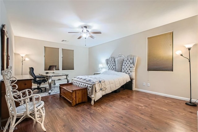 bedroom featuring ceiling fan and dark wood-type flooring