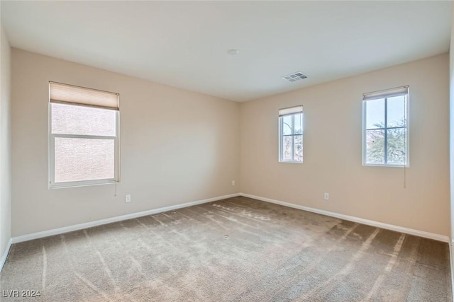 view of carpeted spare room