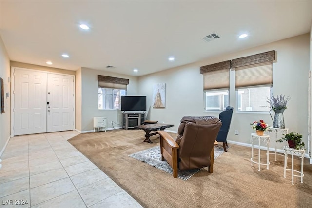 living room with light tile patterned flooring