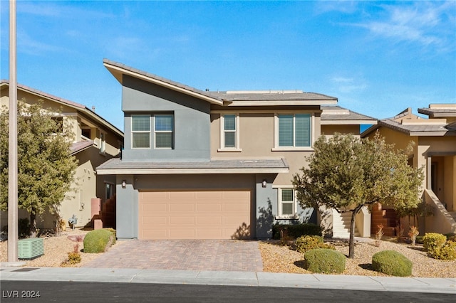 view of property featuring a garage