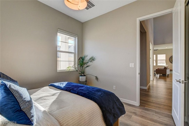 bedroom with light wood-type flooring