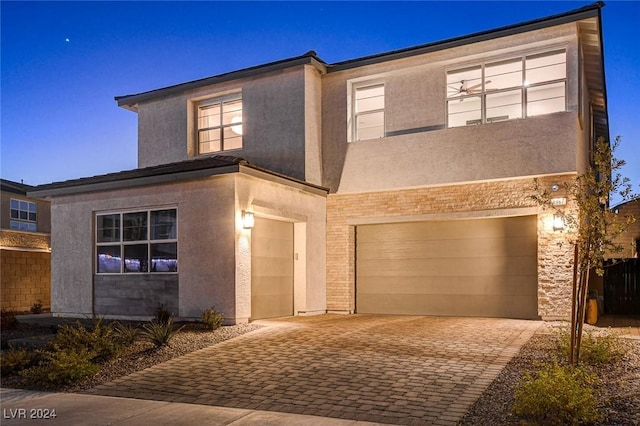 view of front of property with a garage