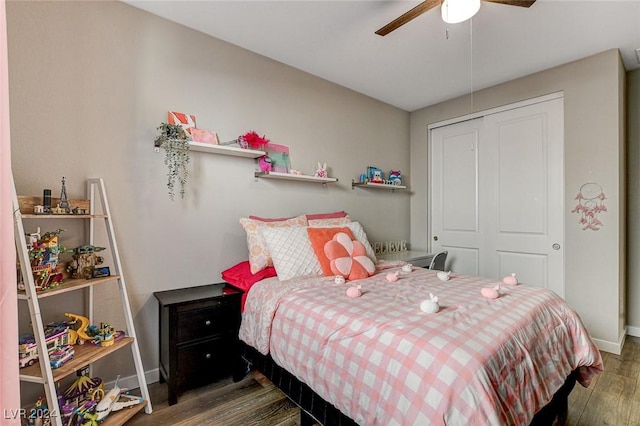 bedroom featuring a closet, ceiling fan, and dark hardwood / wood-style flooring