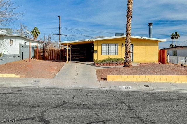 view of front of house featuring a carport